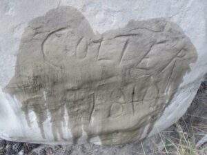 Colter’s name carving on sandstone rock in 1810